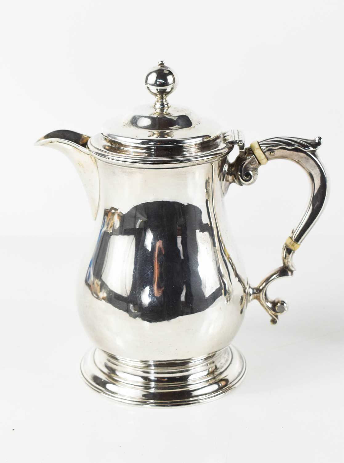 Lot 3 - A George II silver coffee pot of baluster form,...