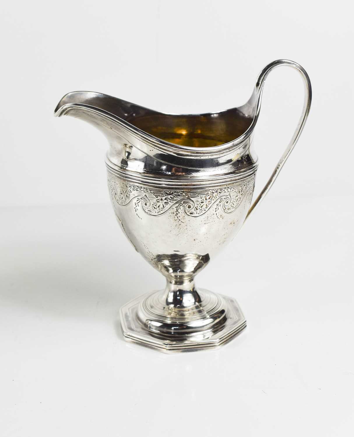 Lot 1 - An 18th century George III helmet pedestal jug,...