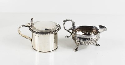 Lot 4 - An early George III silver cream jug, with...