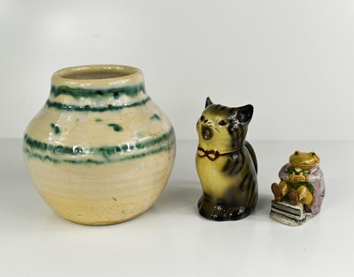 Lot 204 - A Tony Wood cream jug in the form of a cat,...