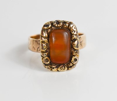 Lot 41 - A 12ct gold Georgian ring, set with an agate...