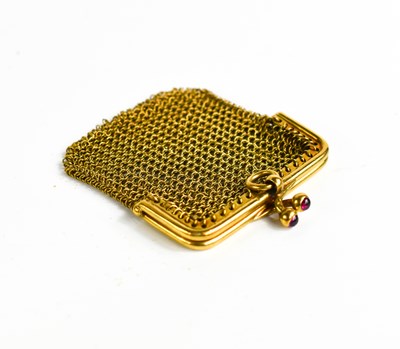 Lot 41 - A 9ct gold mesh coin purse with ruby cabochon...