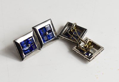 Lot 39 - A pair of white metal and sapphire cufflinks,...
