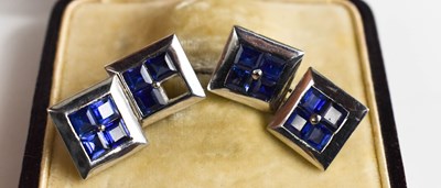 Lot 39 - A pair of white metal and sapphire cufflinks,...