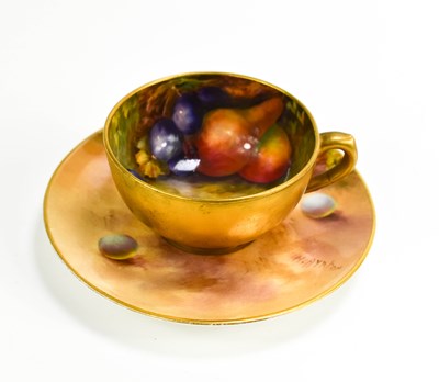 Lot 103 - A Royal Worcester miniature cup and saucer,...