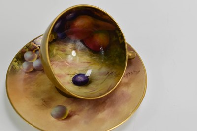 Lot 103 - A Royal Worcester miniature cup and saucer,...
