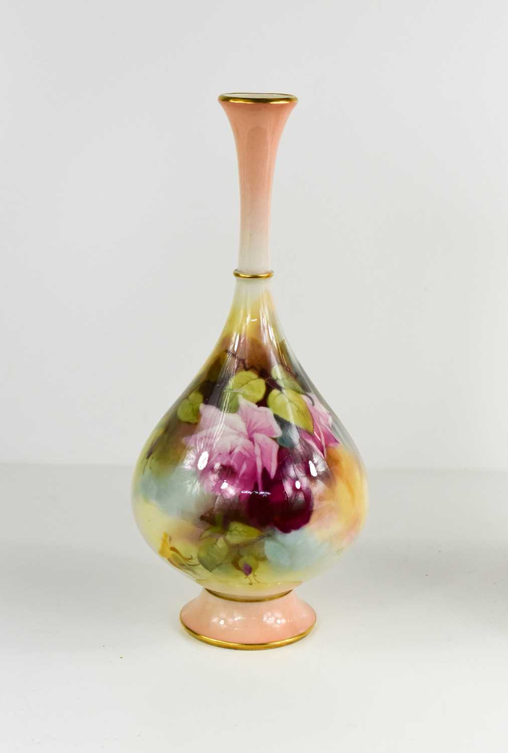 Lot 104 - A Royal Worcester bulbous vase with pink and...