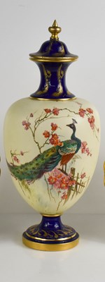 Lot 142 - A Royal Worcester vase and cover, painted with...