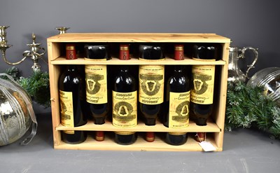 Lot 63 - A case of twelve bottles of Chateau Angelus,...