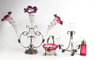 Lot 214 - A Victorian epergne, the plated stand holding...