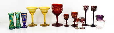 Lot 134 - A group of coloured bohemian glassware, to...