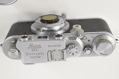 Lot 109 - A 1950's Leica camera, model number IIIF,...