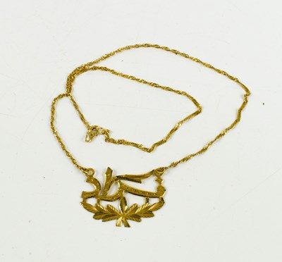 Lot 137 - An 18ct gold necklace with integral Arabic...