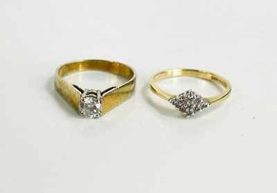 Lot 90 - A 9ct gold and diamond ring, set with nine...
