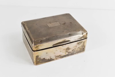 Lot 308 - A silver cigarette box, with engine turned...