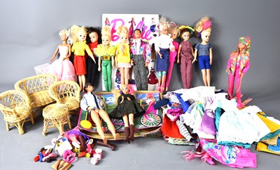 Lot 331 - A group of vintage Sindy, Barbie and Ken dolls...