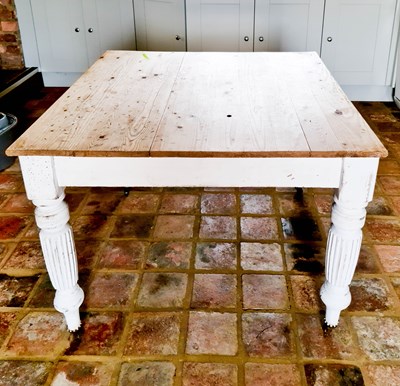 Lot 365 - An antique pine kitchen table, with a grey...