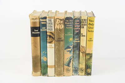 Lot 424 - A set of eight Ian Fleming, James Bond novels,...