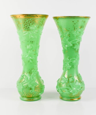 Lot 181 - A pair of Baccarat green opal glass vases with...