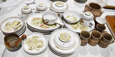 Lot 220 - A part Denby dinner service, comprising dinner...