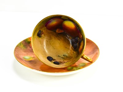 Lot 106 - A Royal Worcester cup and saucer, the cup...