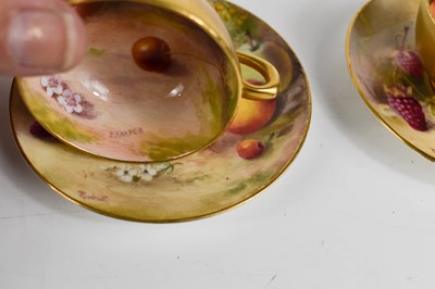 Lot 131 - A pair of Royal Worcester miniature cups and...