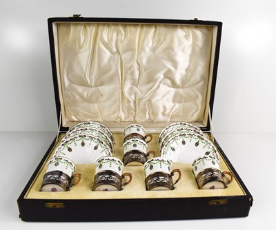 Lot 135 - A cased set of Royal Worcester coffee cans and...