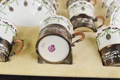 Lot 135 - A cased set of Royal Worcester coffee cans and...