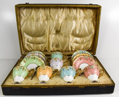 Lot 143 - A cased set of Royal Crown Derby tea cups and...