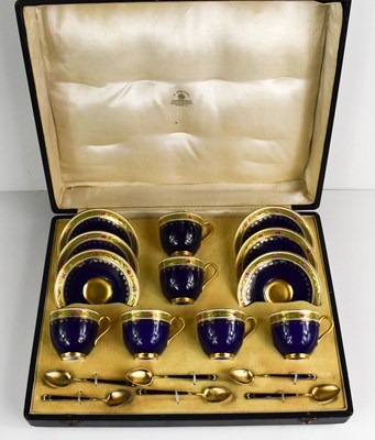 Lot 149 - A set of Royal Worcester coffee cups and...
