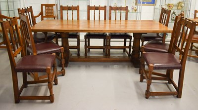 Lot 589 - Leon Keogh 'Owlman' oak dining table with...