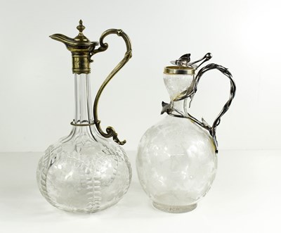 Lot 168 - Two 19th century glass Claret jugs, with...