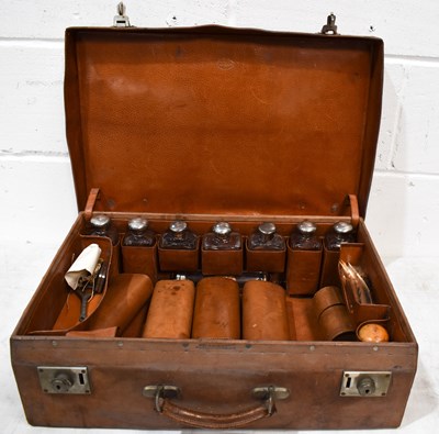 Lot 393 - A 19th century gentleman's travelling suitcase,...