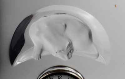 Lot 180 - A Lalique glass clock, depicting a cat above...