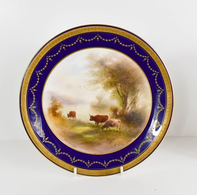 Lot 122 - A Royal Worcester plate painted with lowland...
