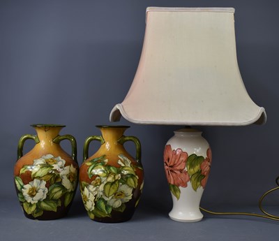 Lot 216 - A Moorcroft lamp base, together with a pair of...