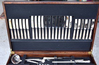 Lot 572 - A mahogany canteen table of cutlery for twelve...