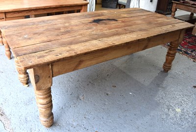 Lot 577 - A antique pine kitchen / dining table with...