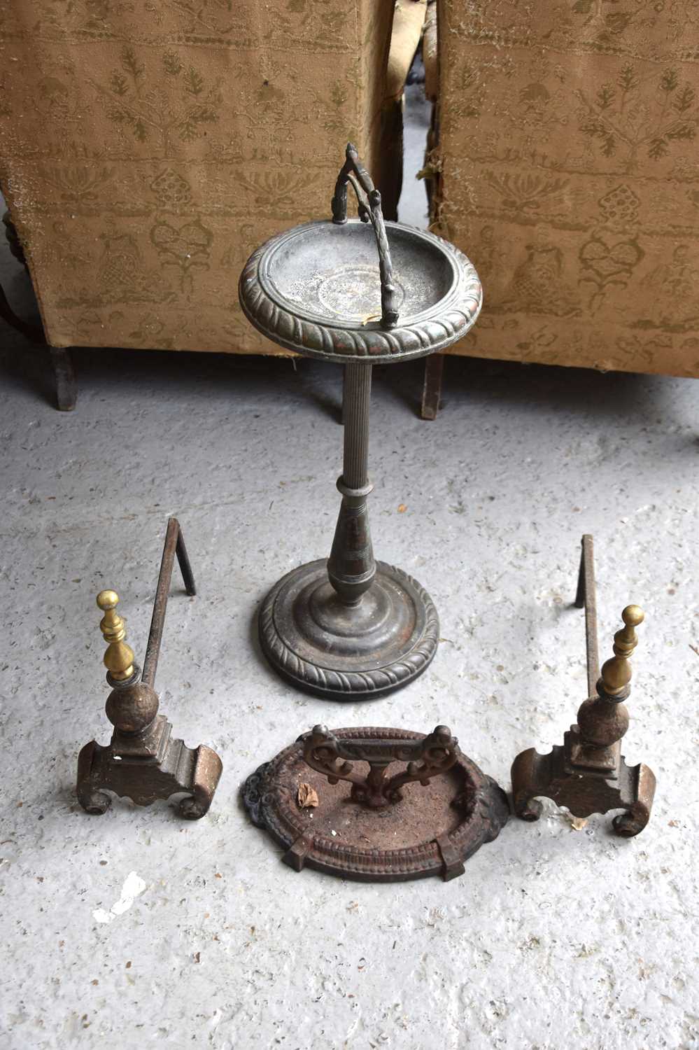 Lot 381 A pair of antique cast iron andirons