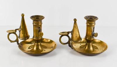 Lot 63 - A pair of antique brass chamber sticks with...