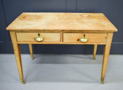 Lot 546 - An antique pine two drawer side table, with...