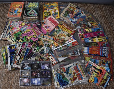 Lot 613 - A group of vintage Marvel and DC comics, some...