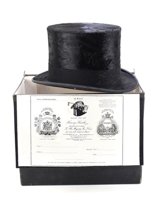 Lot 305 - A Henry Heath black silk top hat in the...