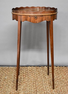 Lot 496 - A fine 19th century oval top table with candle...