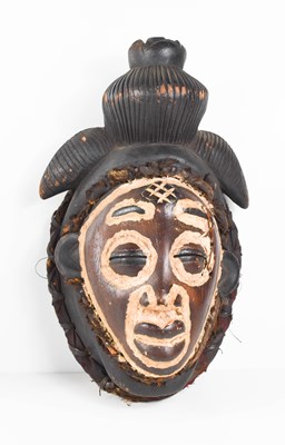 Lot 11 - A West African face mask, likely late 19th...