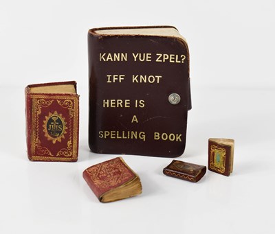 Lot 532 - A collection of miniature books comprising...