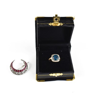 Lot 89 - A 9ct gold dress ring, set with teal blue...