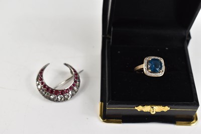 Lot 89 - A 9ct gold dress ring, set with teal blue...
