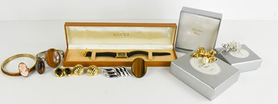 Lot 225 - A lady's Gucci wristwatch, the rectangular...