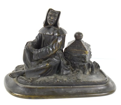 Lot 87 - A bronze inkwell modelled in the form of...